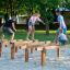 Hip Hop wooden balance beams playground equipment with children playing.