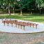 Hip Hop playground balance beams installed on sandy ground in a park.