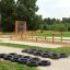 Tires (10 pcs) arranged on an outdoor playground course.