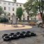 Playground with Tires (10 pcs) arranged on asphalt.