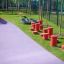 Tires (10 pcs) arranged in a playground, near red stepping stones and purple play area.