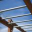 Horizontal Ladder Large – outdoor playground equipment with metal rungs and wooden frame.