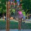 Children climbing on V-shape Net Large climbing net on playground