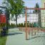 Large climbing net 'V-shape Net Large' in playground with other obstacle course elements.