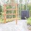 Step And Climb wooden ladder in a forest obstacle course.