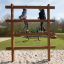 Children climbing on Step And Climb wooden ladder at playground