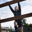 Person climbing on Step And Climb wooden ladder