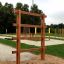 Step And Climb wooden ladder in an outdoor playground setting