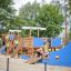 Children playing on Majestic ship with slide in a playground