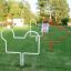 Outdoor training equipment Aim Practice II on a grassy field with trees in the background.