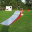 Ramp playground equipment on a green lawn