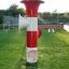 Playground equipment Ball catcher on grassy field