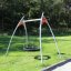 Outdoor playground with Single Swing (BNS) on a green lawn.