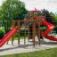 Twister castle with slide for children in a playground.