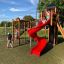 Children playing on Twister castle with slide.