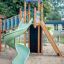 Twister castle with slide in a playground