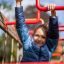 Twister castle with slide, colorful playground equipment with twisting slide and climbing sections