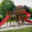 Twister castle with slide for children in a playground.