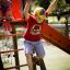 Kids playing on Twister castle with slide in a playground
