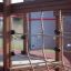 Wooden Gorilla playground structure with climbing nets.
