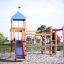 Playground Gorilla with slide and climbing structures.