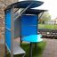 Shelter with table in a playground.