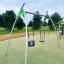 Metal Swing Frame (double swing) in a playground with two swings, one for toddlers and one for older