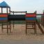 Wooden playhouse Motor Function Center on playground.