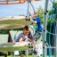 Children playing on Andromeda, steel structure climbing frame