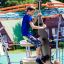 Children playing on Andromeda, steel structure playground equipment