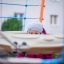 Child playing on Andromeda, steel structure playground equipment