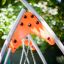 Single Swing playground equipment with orange and silver structure