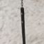 Chain and handle of Double Swing on a sandy playground background.