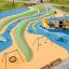 Children's playground with a Double Swing and colorful play structures
