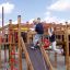 Children playing on the King-Kong castle with slide.