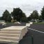 Skate park equipment including ramps and steps, part of Combination 19, in an outdoor setting.