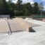Skatepark ramps and rails, Fun Box 13 on a sunny day.
