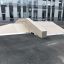 Skateboarding ramp Fun Box 13 in a schoolyard.