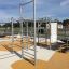 Outdoor fitness equipment New Age Fit MEDIUM set on a playground.