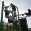 Children playing on New Age Fit MEDIUM outdoor fitness equipment.