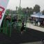 People exercising on New Age Fit MEDIUM outdoor fitness equipment at a public event organized by Lar