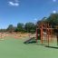 Outdoor fitness playground with New Age Fit equipment.