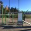 Outdoor fitness equipment New Age Fit station with pull-up bars and climbing frame in a park