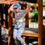 Child playing on Apollo castle with slide at a playground.
