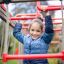 Child playing on Space Station castle with slide