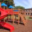 Space Station castle with slide in a playground installation