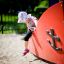 Child playing on Fisher Boat ship playground equipment