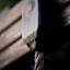 Close-up of Chimpanzee wooden playhouse rope attachment feature.
