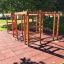 Chimpanzee wooden playhouse on a sunny day in a park.