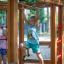 Chimpanzee wooden playhouse with children playing